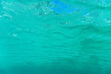 Underwater blue background with sunbeams