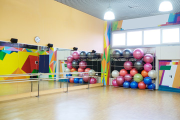 Naklejka premium Fitness or dance hall with fitness equipment