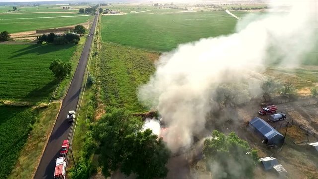 Aerial footage of house burning down
