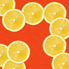 Fototapeta na wymiar yellow lemon slices on Red Background