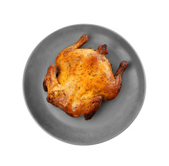 Plate with roasted beer can chicken on white background