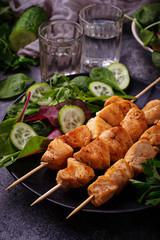 Chicken shish kebabs with green salad