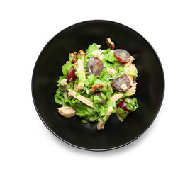 Plate with chicken salad and grapes on white background