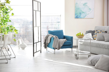 Modern interior of cozy living room