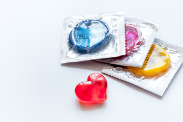 concept male contraception condom on white background top view