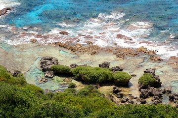 Shoreline islets, Rota  Dramatically formed islets decorate a rocky shoreline in Rota, Northern Mariana Islands