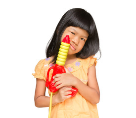 Obraz premium Child holding water gun isolated / Children hold water guns to prepare to play on Songkran Festival in thailand. 