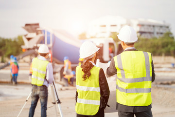 Asia engineer construction standing see plan paper