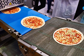 Conveyor for pizza making