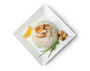 Chicken and rice on plate isolated on white