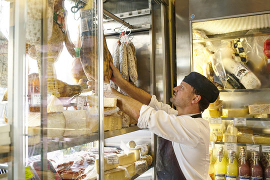 Sweden, Man working in food store