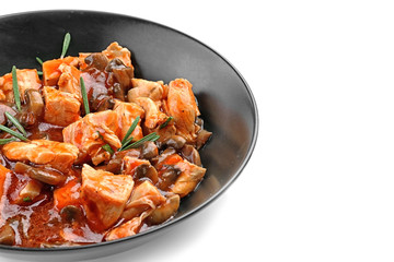 Chicken cacciatore in plate isolated on white