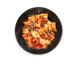 Chicken cacciatore in plate isolated on white