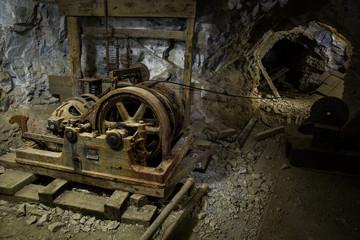 Old rusted equipments inside a mine
