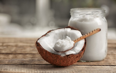 Fresh coconut oil on wooden table