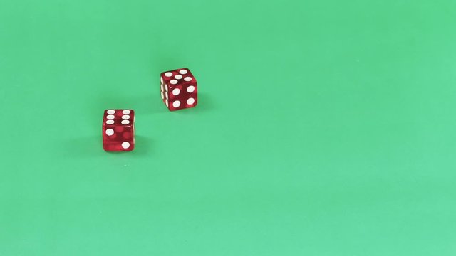Dice on green background