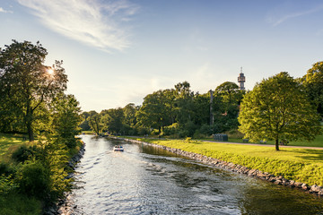 Sweden, Uppland, Stockholm, Djurgarden, Boat on canal in park