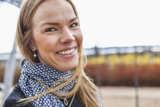 Sweden, Blekinge, Solvesborg, Portrait of smiling mid adult woman