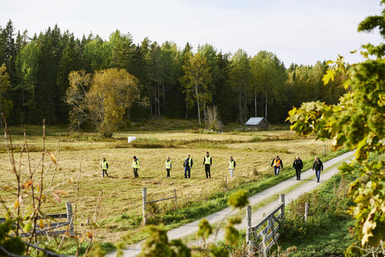 Sweden, Uppland, Rison, Volunteers helping emergency services find missing people