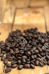 roasted coffee beans on wooden table