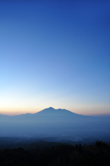 Colorful sky with sun background in mountains