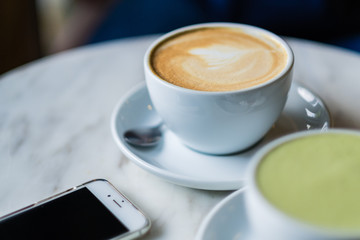 Soft focus on latte coffee cup