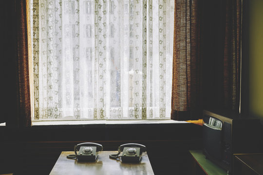 Germany, Berlin, Vintage phones on table in Stasi museum