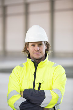 Sweden, Portrait of man wearing reflective jacket and helmet