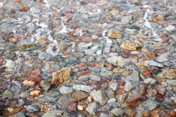 Sea waves crashing to the rocks shore