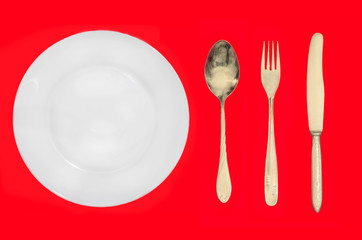 plate, spoon, fork and knife
