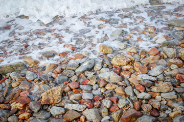 Sea waves crashing to the rocks shore