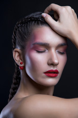 Fototapeta na wymiar woman with Braids hairstyle and red lips