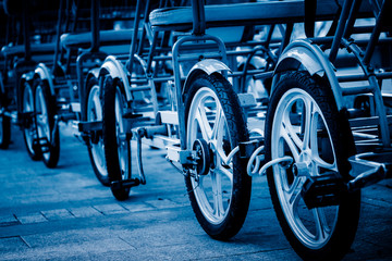 Fototapeta na wymiar detail shot of bicycle rental point in an amusement park.