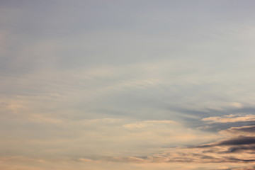 Naklejka na ściany i meble the clouds in the sky at sunset