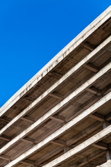 Modern concrete building structure under construction - 143390983