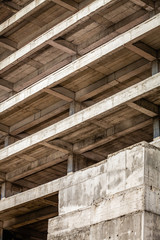 Modern concrete building structure under construction - 143391115