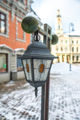 Old street lamp. Winter day in the city, Riga, Latvia.