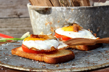 Fried eggs and bacon. tasty breakfast