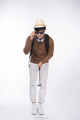 Happy young asian man taking self portrait photography through smart phone