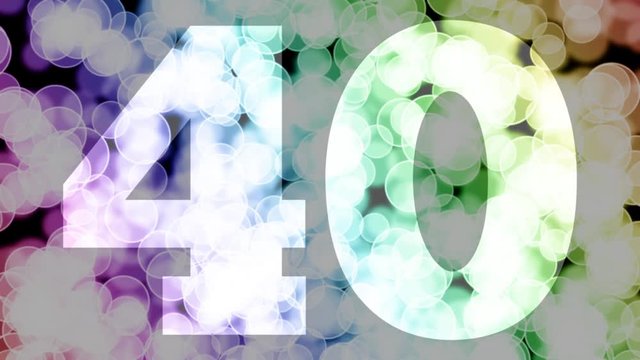 Forty to forty one years birthday fade in/out animation with color gradient moving bokeh background. Animation: 90 frames still with number, 180 fade out, 30 clear, 180 fade in, 300 still.