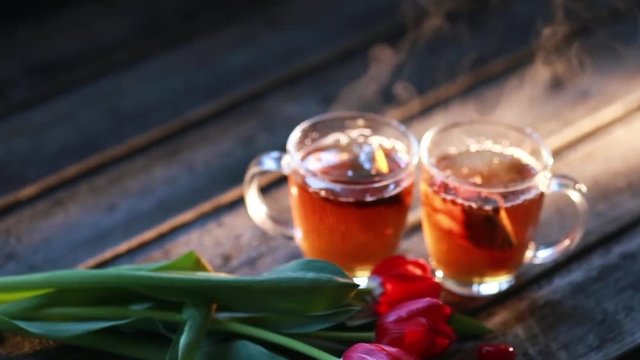 tea and milk on the wood backround