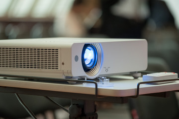 Projector demonstrates the presentation at the conference