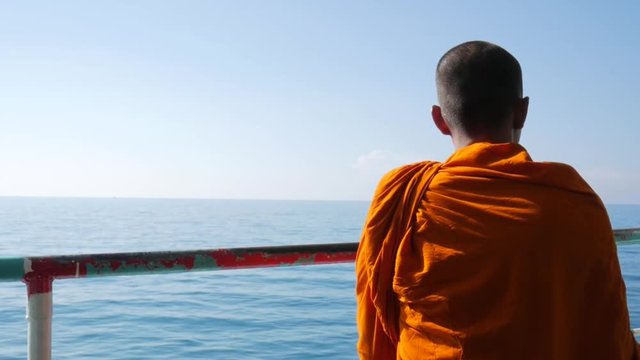 Meditating Buddhist Monk at Ferry Ship to Koh Phangan, Thailand. HD Slowmotion.