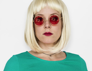 A Girl with a Blonde Wig and Sunglasses Staring