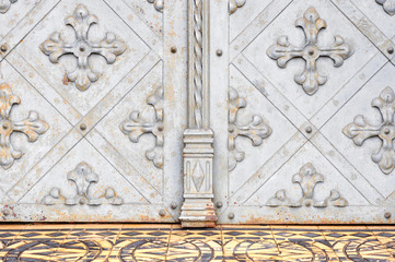 White vintage texture of door with the crosses.