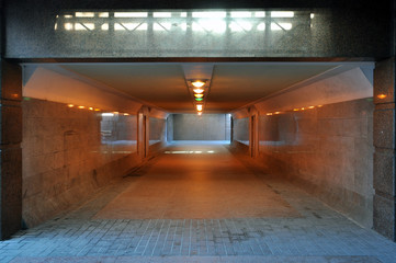 Rectangular underpass with switched on light in perspective. Grodno, Belarus.