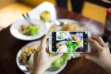 People use smart phone for taking photo