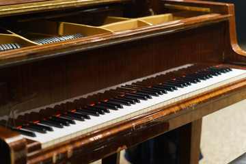 Fototapeta na wymiar classic key piano. brown classic a piano