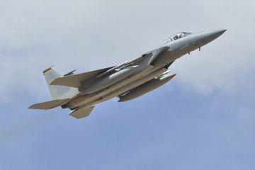 Fototapeta na wymiar F-15 fighter plane taking off