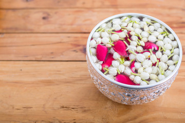 Songkran festival, Thai people prepare water perfume with flower on Thailand New Year.